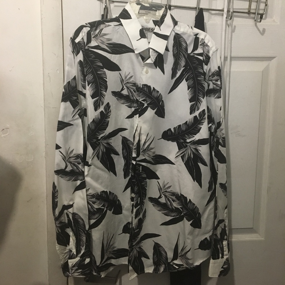 A long sleeve express shirt with palm tree leaves