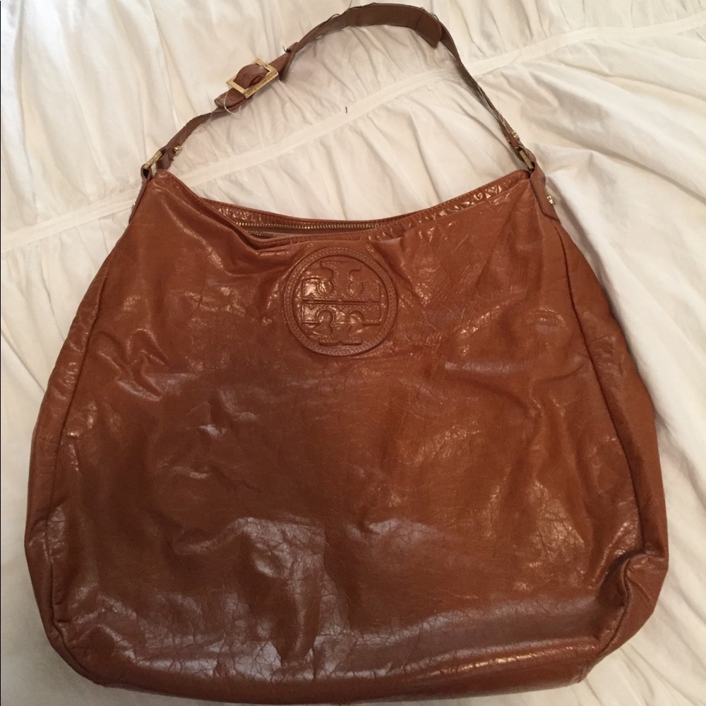 TORY BURCH TOTE. Gently used. Saddle brwn leather.