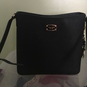 Black cross body Michael kors purse