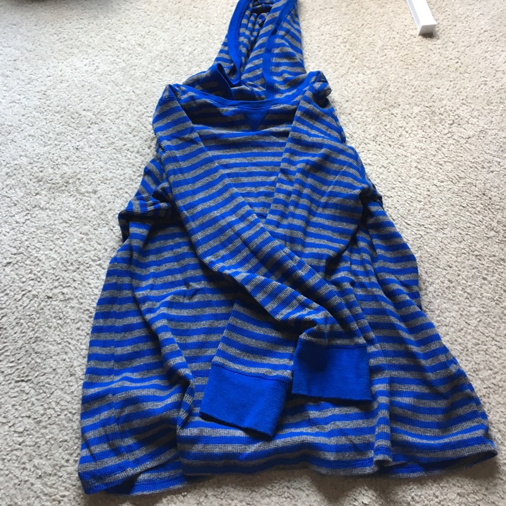 Woman within waffle knit hooded sweatshirt