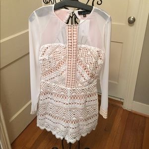 Cute lace romper with back cutout. Size M (6-8)