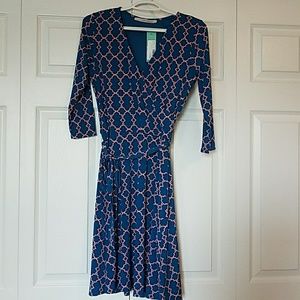 Short wrap style dress with 3/4 length sleeves