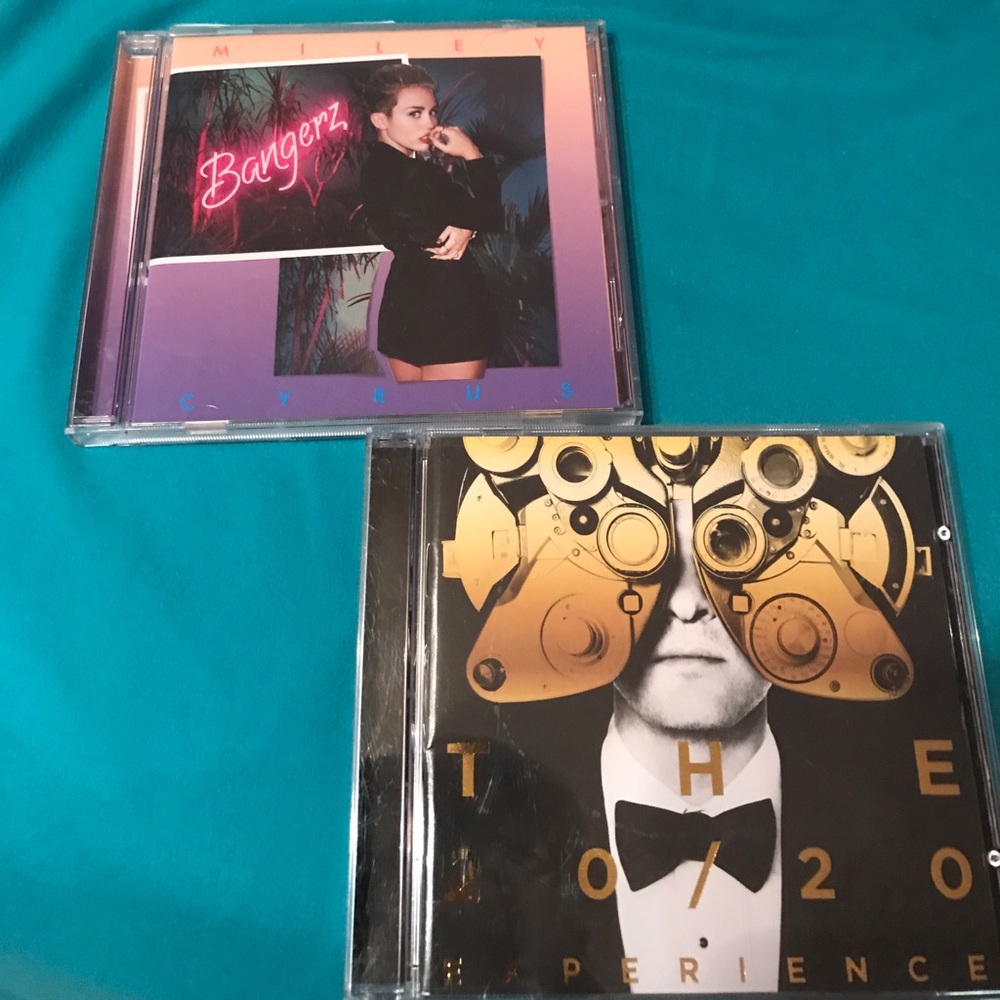 Miley Cyrus and Justin Timberlake CDs