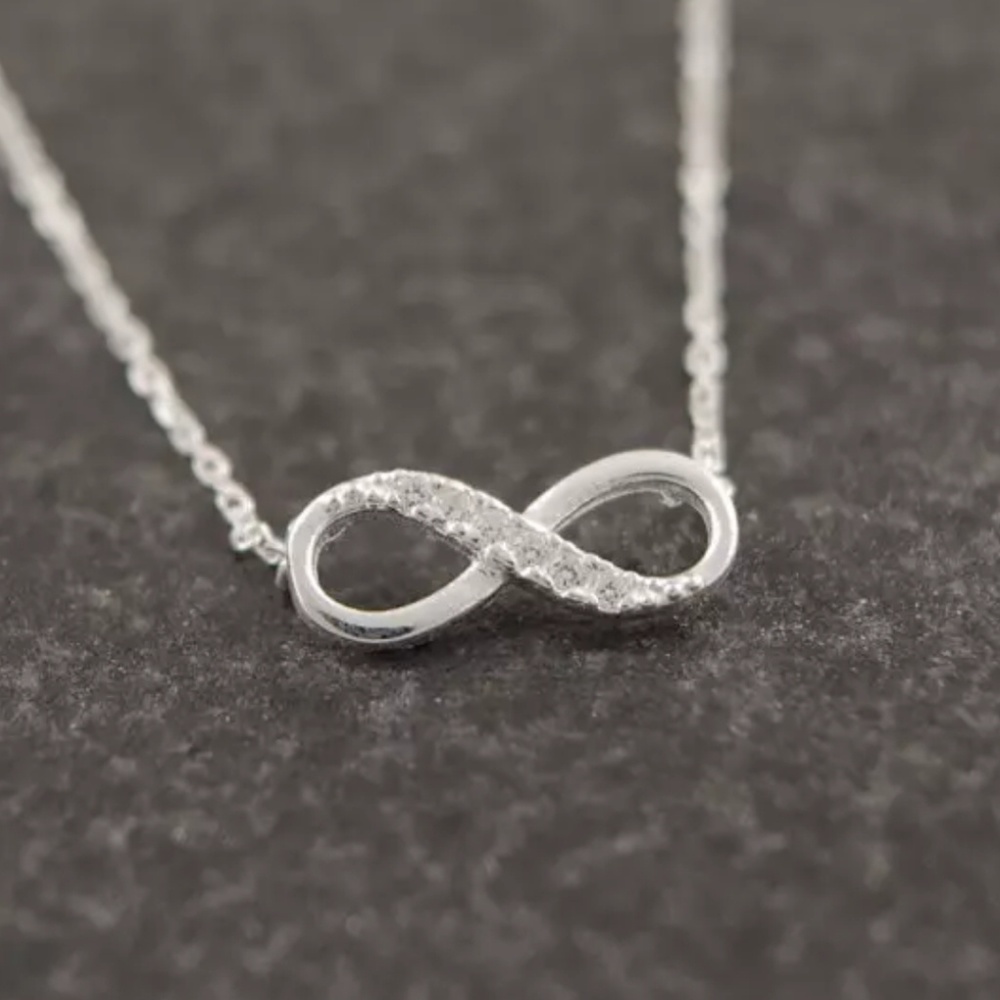Silver colored infinity necklace