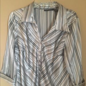 Blue diamond Button down blouse.