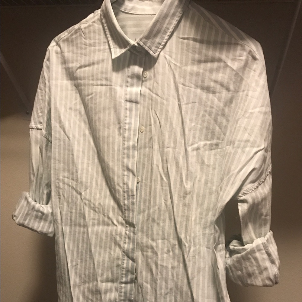 Button up, frayed blouse
