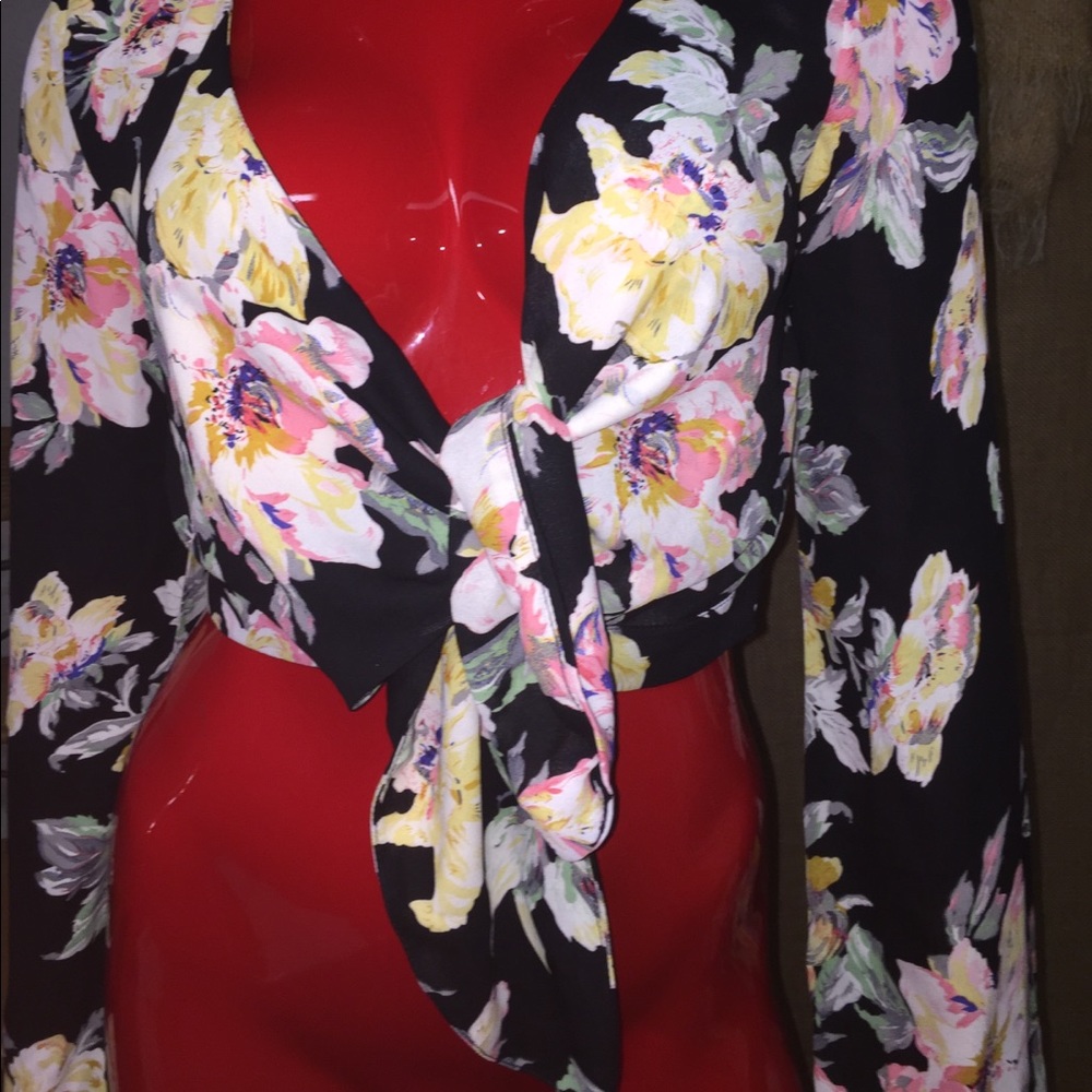 Floral cropped top with front tie and bell sleeves