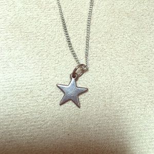 Tiny sterling star charm