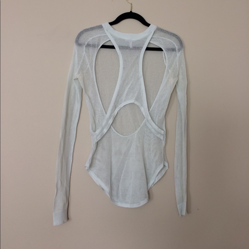 Mesh/fishnet long sleeve with amazing cut outs