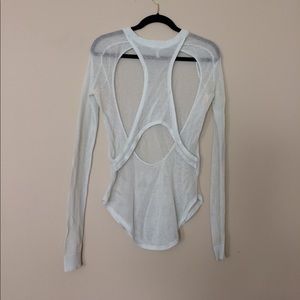 Mesh/fishnet long sleeve with amazing cut outs