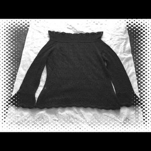 Designed in France, wide neck filigree sweater.