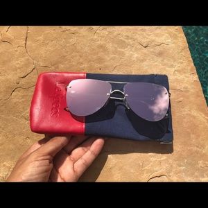 Le Specs Pink reflection.