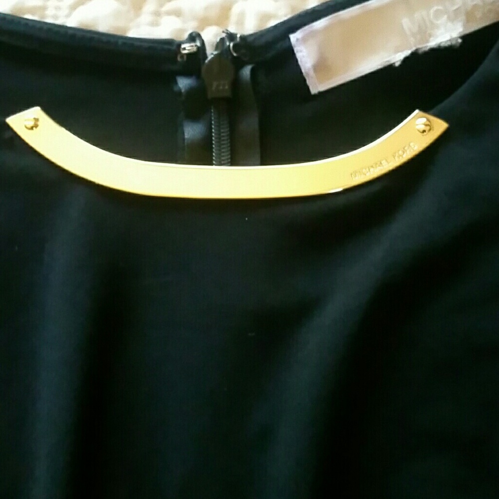 Michael Kors black with Gold Hardware shirt.