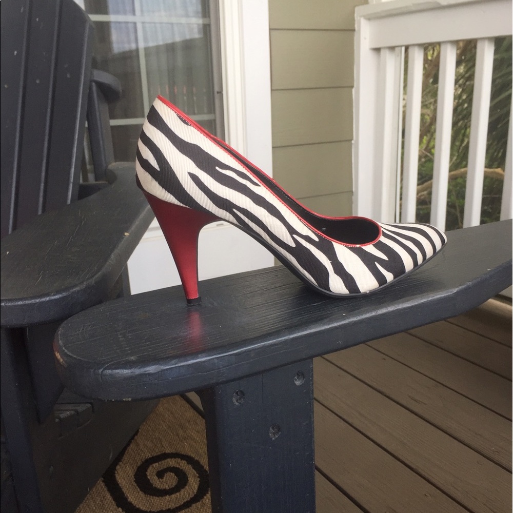 Zebra pumps with red heels