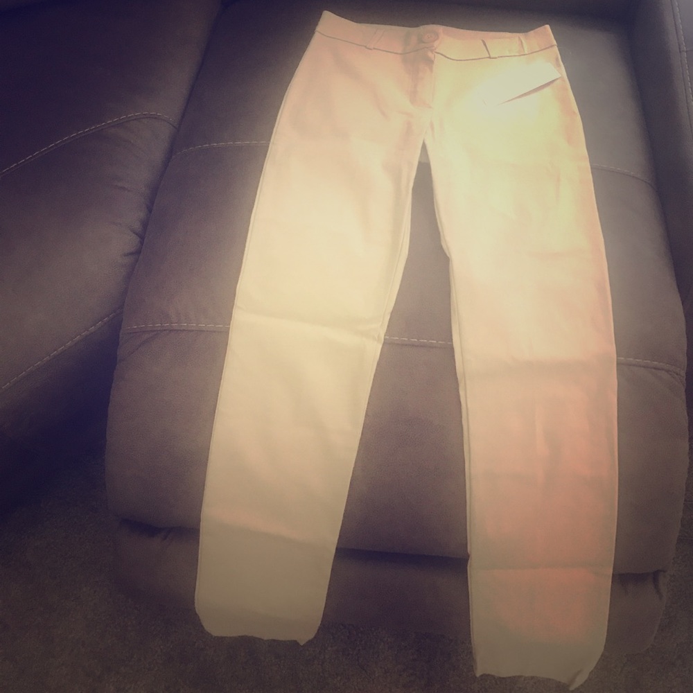 Tan dress pants.