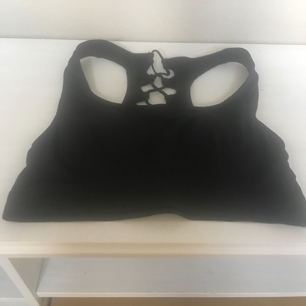 Black strappy sports bra.