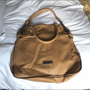 Convertible Steve Madden fold-over bag.