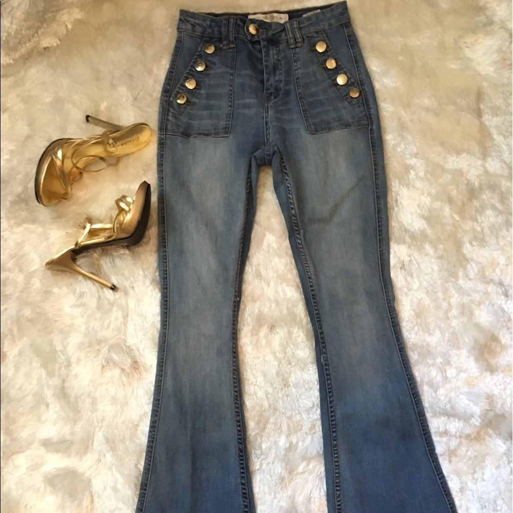 Gold button flare jeans.