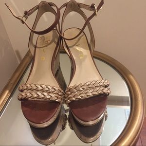 Cork heel wedge sandal with subtle gold straps