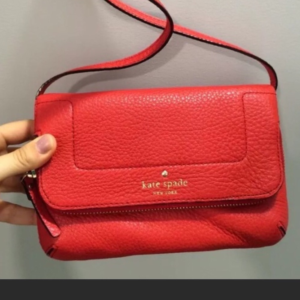 Red Kate Spade purse. Brand New with dust bag!