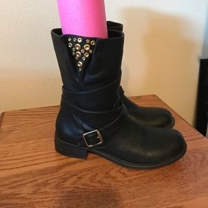 black boots with gold accents