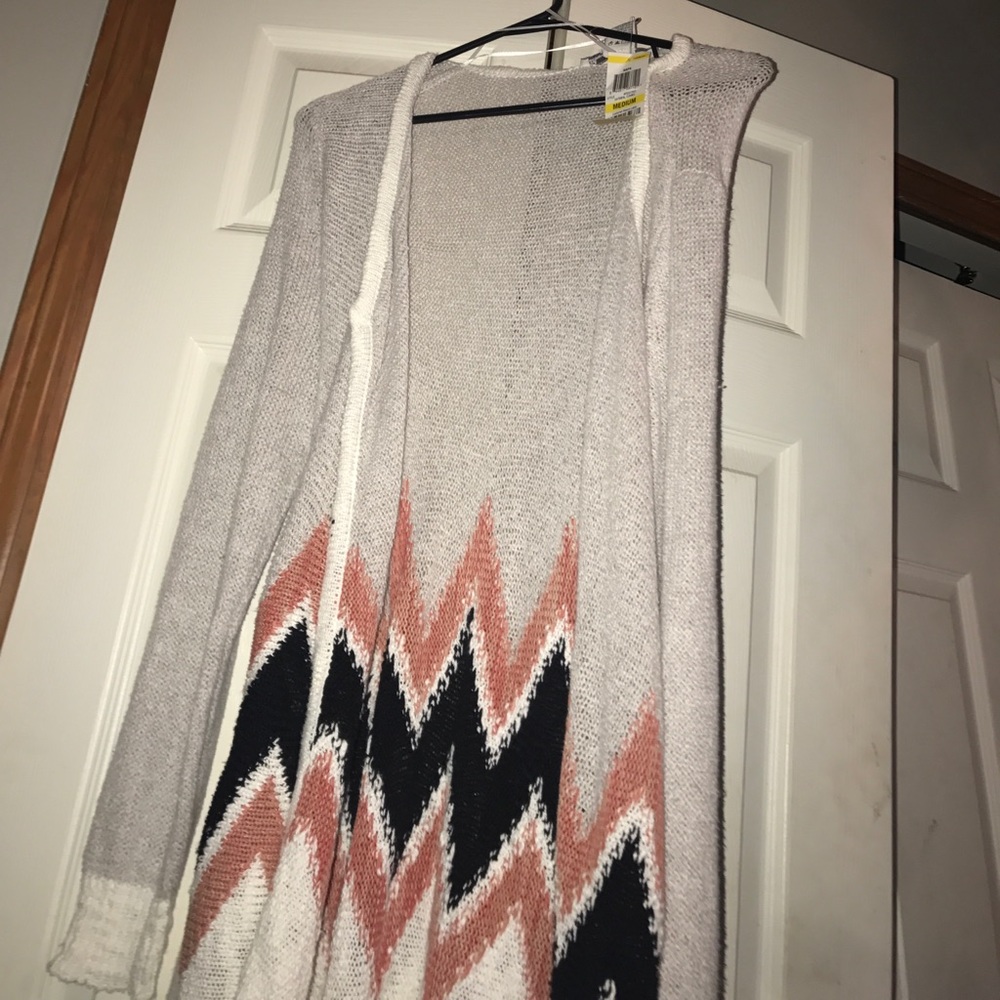Adorable cardigan sweater with belt brand new !