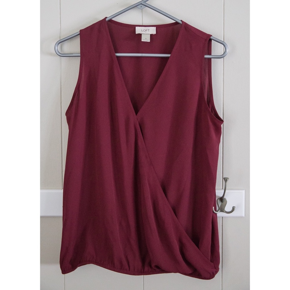 Sleeveless cross-front blouse