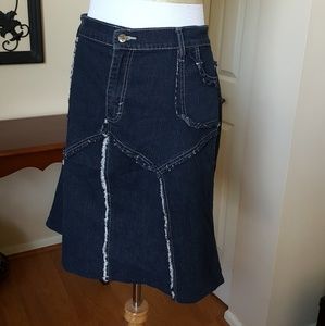 Denim A-line skirt with fringe detail