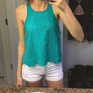 Flowy top embroidered circles.Slightly open back.