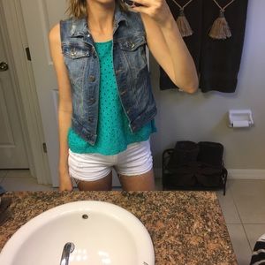 Medium wash jean sleeves jacket.