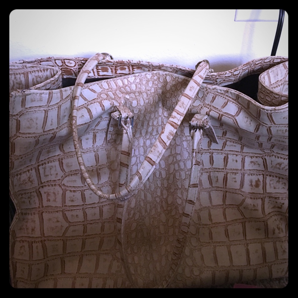 Cream colored shoulder bag