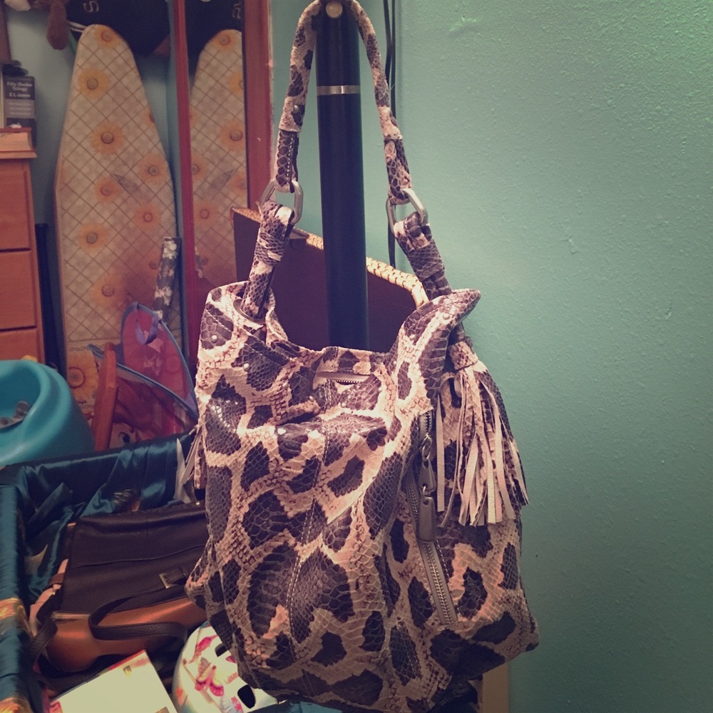 Beautiful snake skin tassel handbag