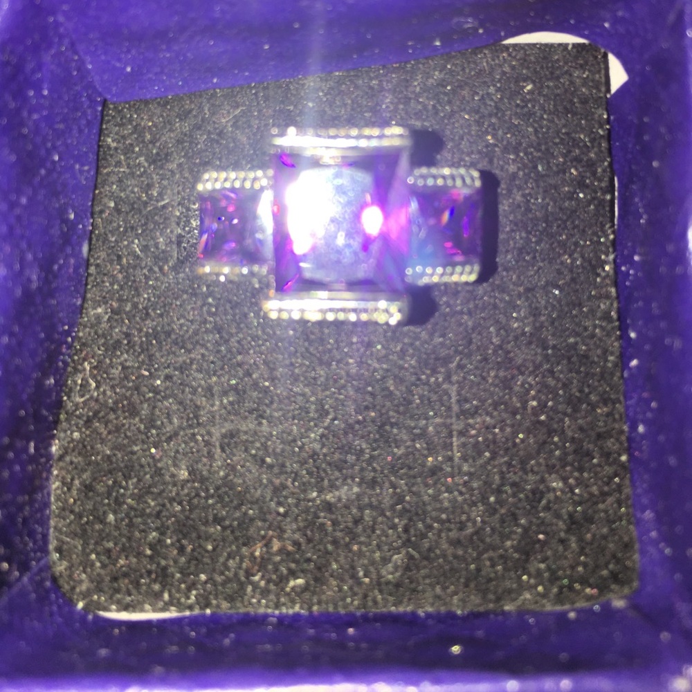 Purple three stone ring