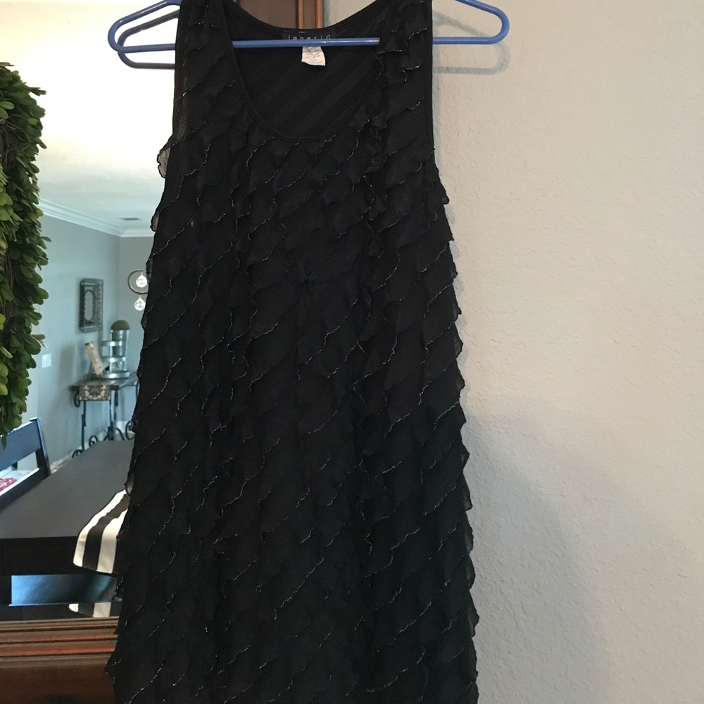 Black tank top with ruffles tipped with silver