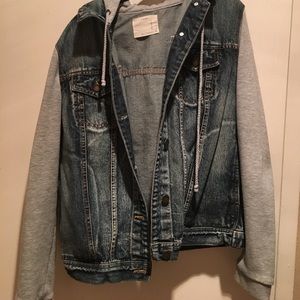 Denim jacket with sweater sleeves