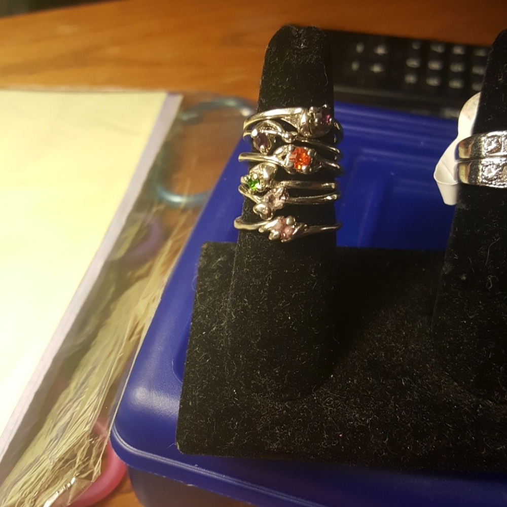 Set of silver rings assorted sizes and colors