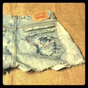 Vintage acid washed tie dyed Levi cut offs