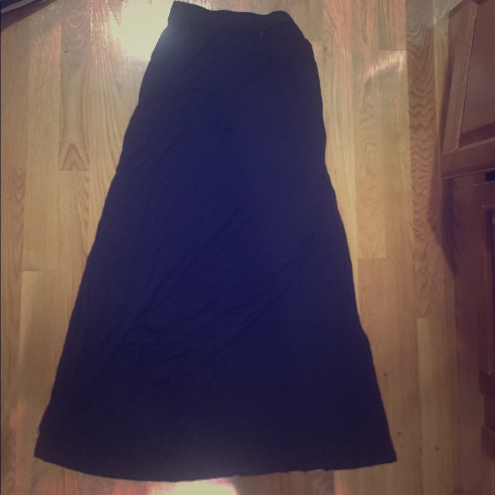 Long black skirt with a side slit up to thigh