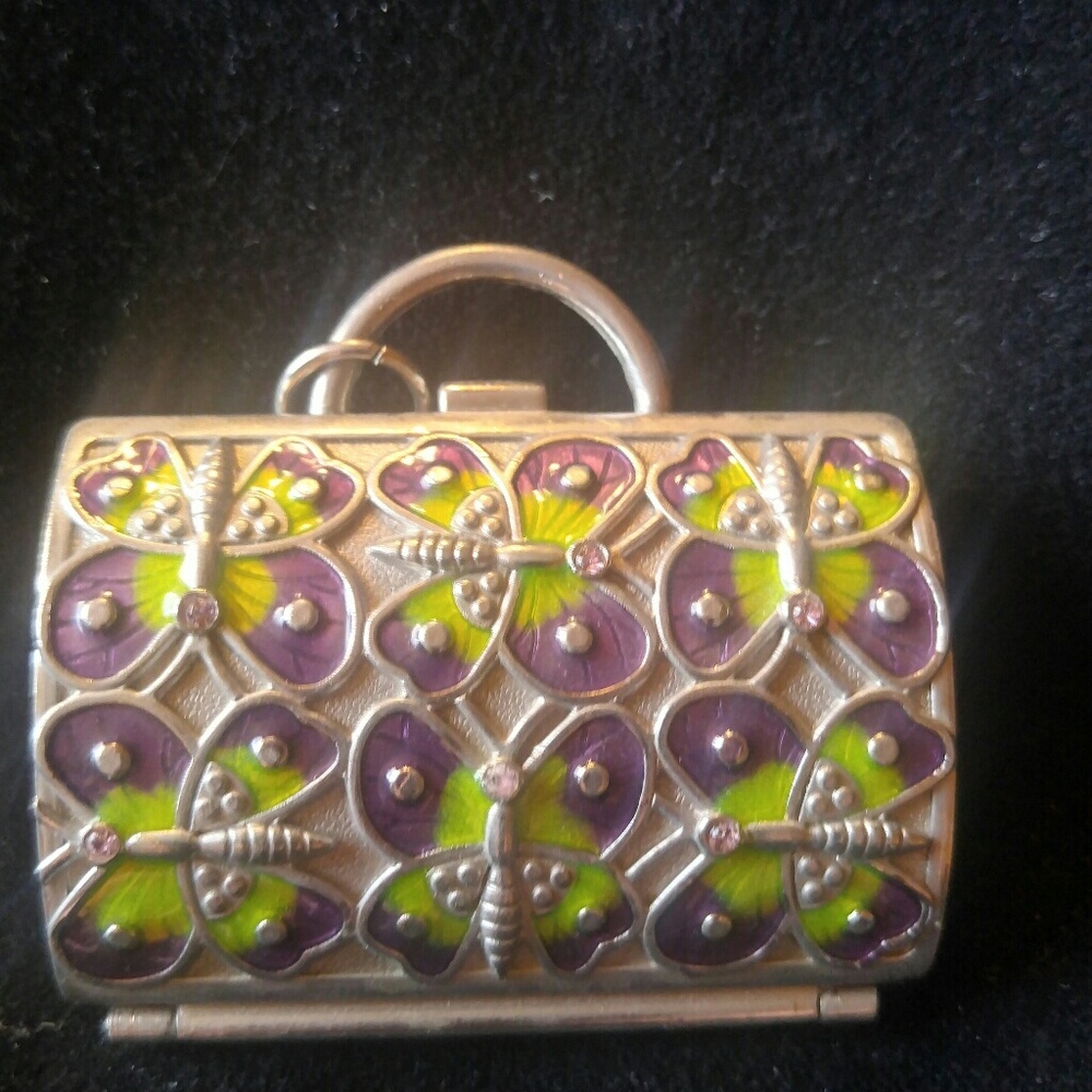 Judith Lieber coin purse and pendant