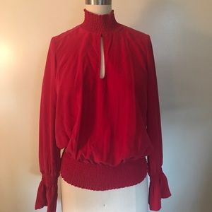 BEBE Long sleeve smock neck and waist blouse