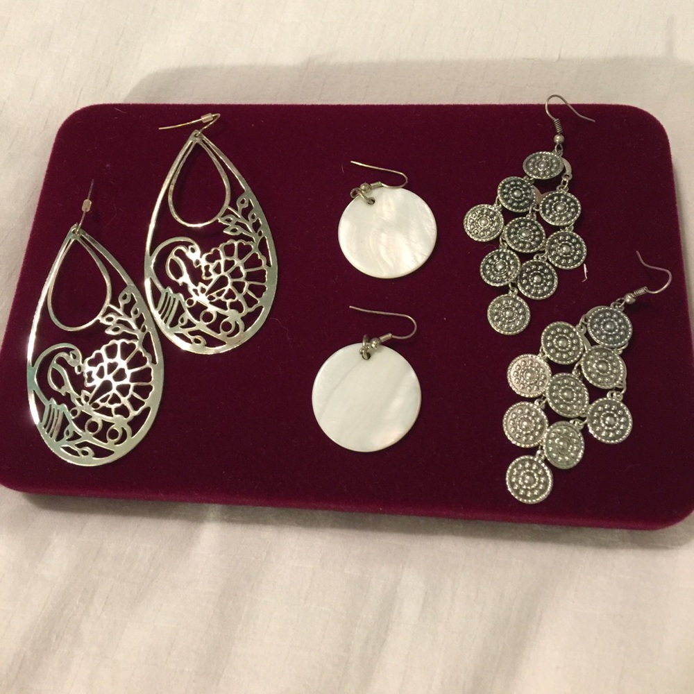 Three pairs of silver earrings