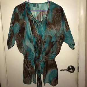 Two piece stretchy tank and lightweight cover.