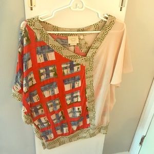 Two-toned, bold pattern and semi-sheer top