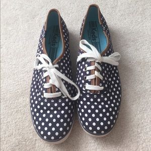 Blue and white Keds