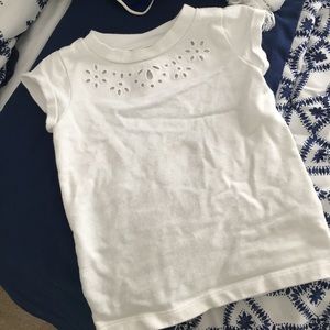 Cute top with cutout flowers detail