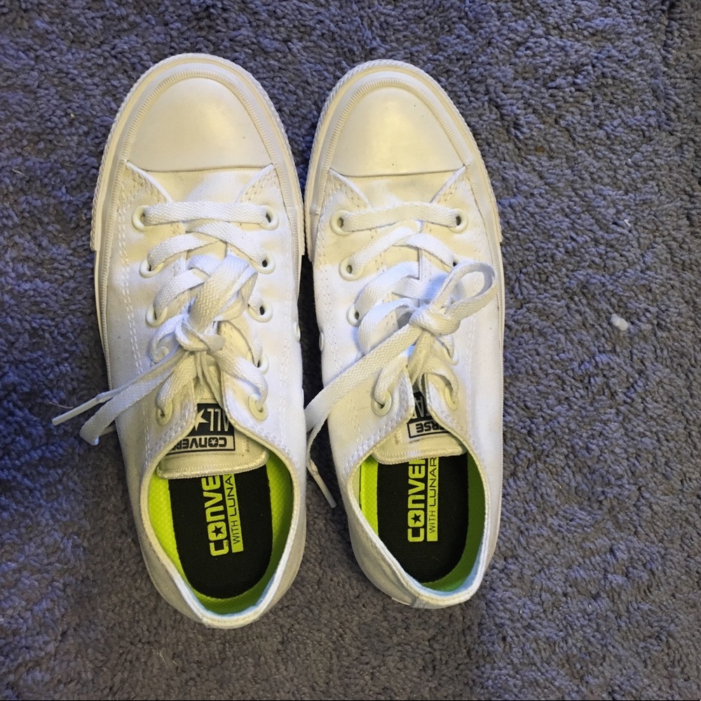 Converse Chuck Taylor II Low Top White sneakers.