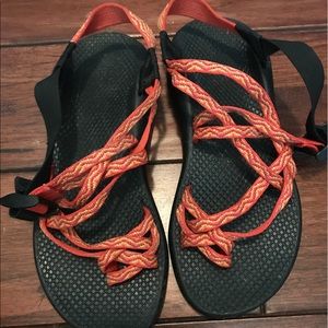 Orange and black chacos!