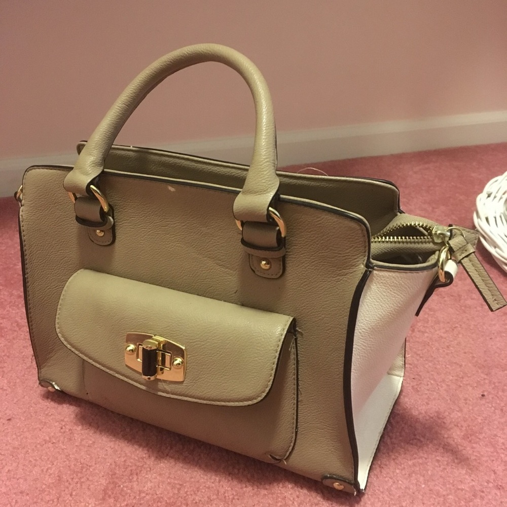 tan and white purse
