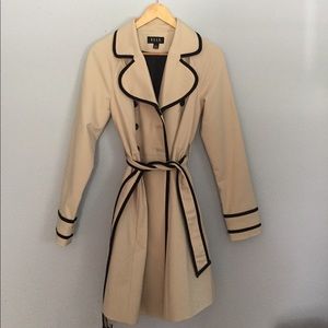 Tan trench coat w/ black lining