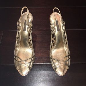 Louis Vuitton gold heels